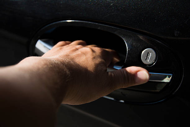 istock Opening car door 510013943