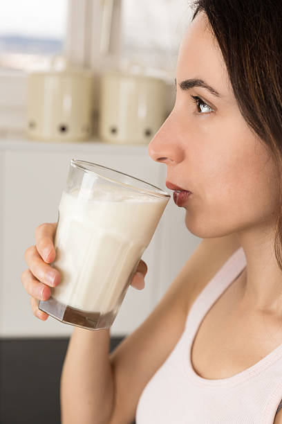 istock Profile of woman drinking milk 510015172