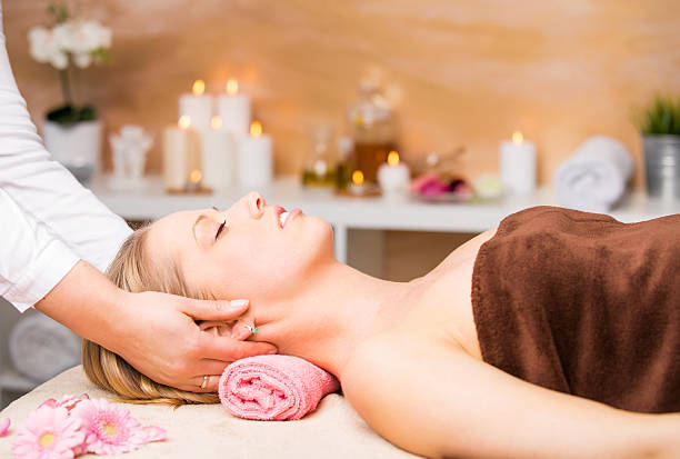 Beautiful blonde woman getting facial massage at spa Beautiful blonde woman getting facial massage at spa free of charge photos stock pictures, royalty-free photos & images
