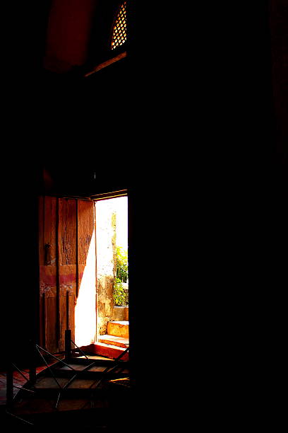 istock sunlight shining through the a vintage door 510017200