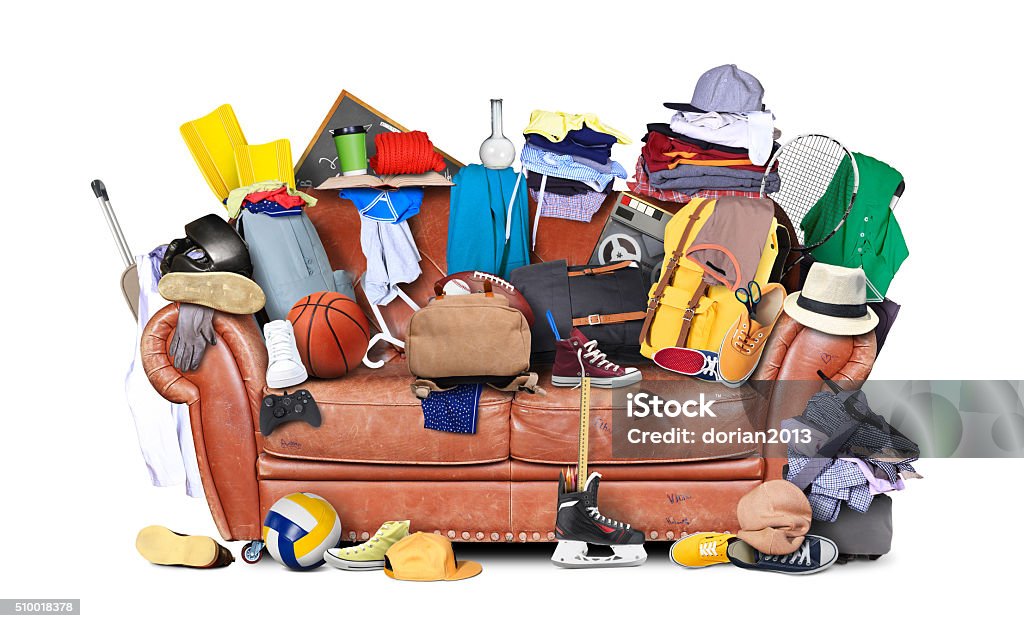 Mess Large leather sofa with a bunch of different things Heap Stock Photo