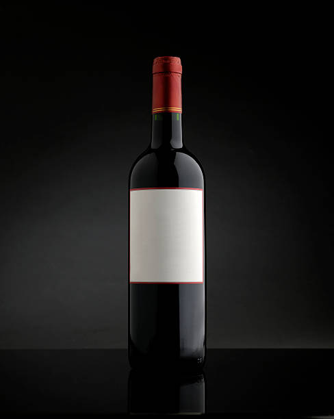 istock bottle of red wine on white background 510018892