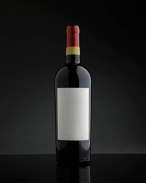 istock bottle of red wine on white background 510019956