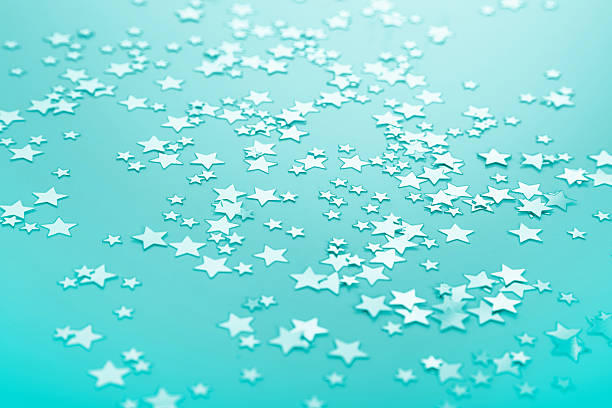 istock Turquoise or green background with shinny stars. 510037277