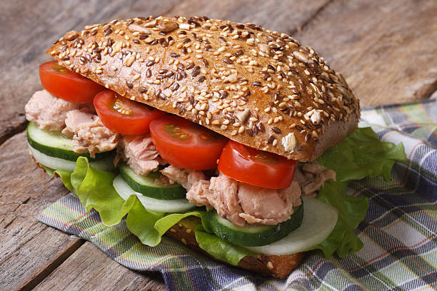 istock tasty sandwich with tuna and vegetables closeup on table 510038459