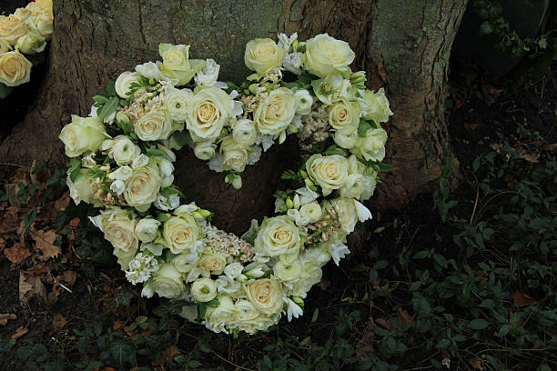 istock Heart shaped sympathy flowers 510038781