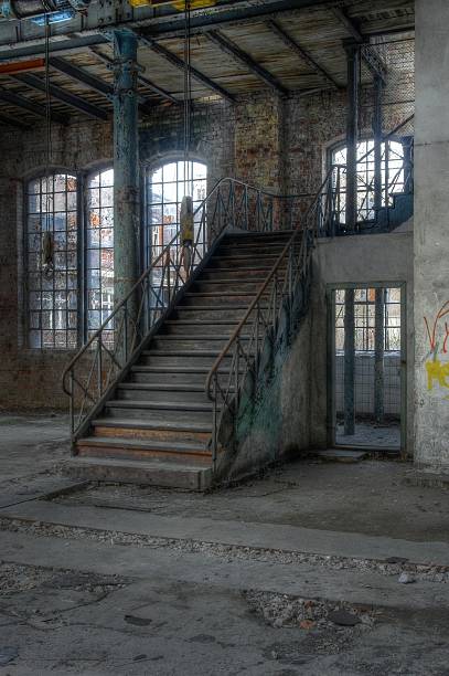 istock Old staircase in an abandoned hall 510040627
