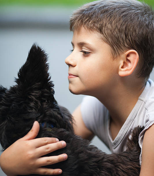 istock Little boy and his dog 510040733