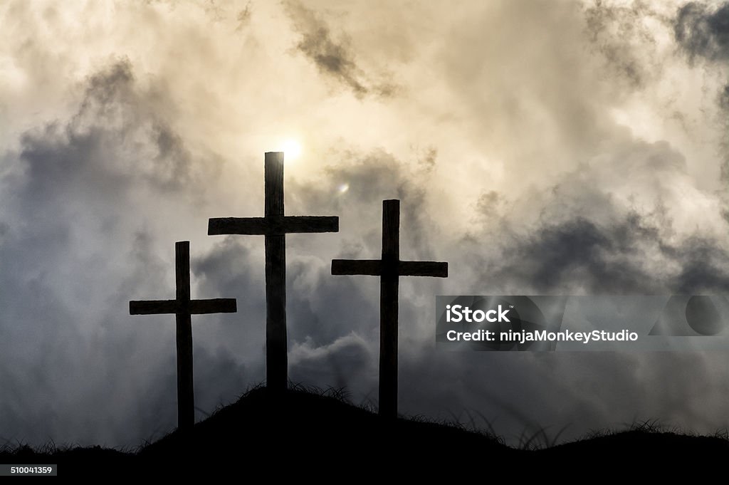 Heavenly Victory After the Crucifixion An other worldly sky overshadows the crosses symbolizing Christ's victory and ascension into heaven. Jesus Christ Stock Photo