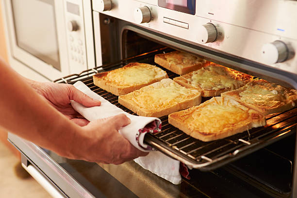 istock Cheese On Toast Being Grilled In Oven 510042069