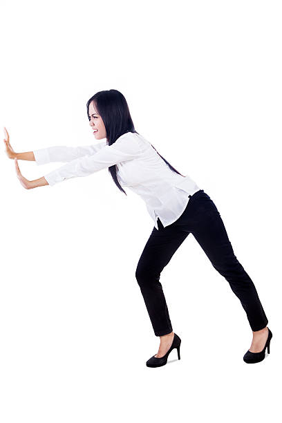 istock Businesswoman push something on copyspace 510042327