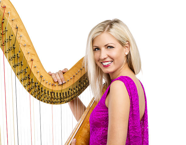 istock Woman with harp 510042335