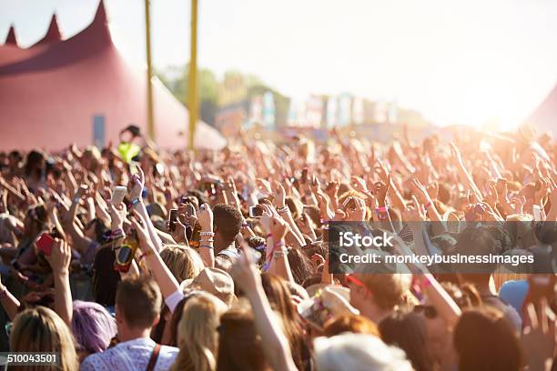 Audience At Outdoor Music Festival Stock Photo - Download Image Now - Music Festival, Crowd of People, Outdoors