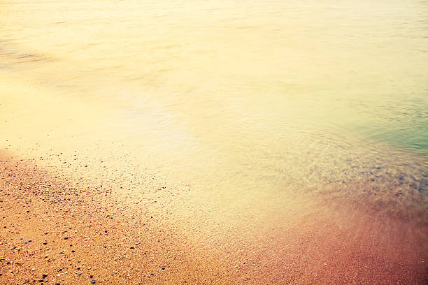 Long Exposure Of Sea Ocean Water Beach Long Exposure Of Sea Ocean Water Beach Background ocean beach papua new guinea stock pictures, royalty-free photos & images