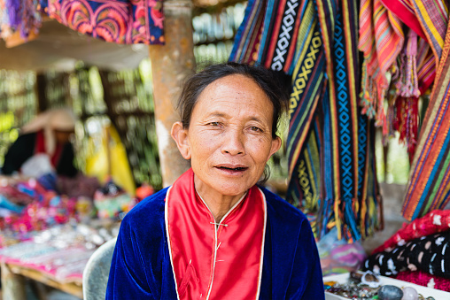 Chiangmai,Thailand - December 6: unidentified elderly woman Dara-ang (Palaung) sells souvenirs, Palaung people is a minority ethnic group living in northern Thailand, Chiang Mai Province Thailand 6 December 2015