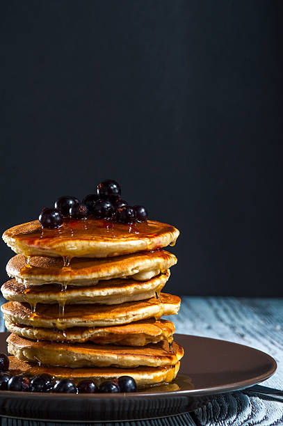 istock homemade pancakes with berries and honey 510055776