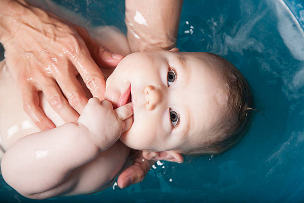 istock lovely baby in bath 510056742