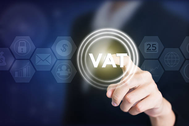 Business woman holding posts in VAT. Business woman holding posts in VAT. Can be used in advertising. vat stock pictures, royalty-free photos & images
