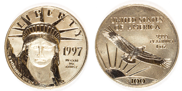 Front and back of a hundred dollar 1997 platinum coin.