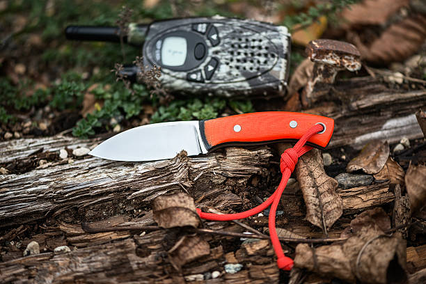 istock Orange penknife and radio device 510061520