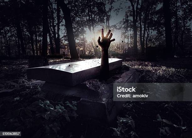 Hand Rising Out From The Grave Stock Photo - Download Image Now - Grave, Coffin, Moving Up