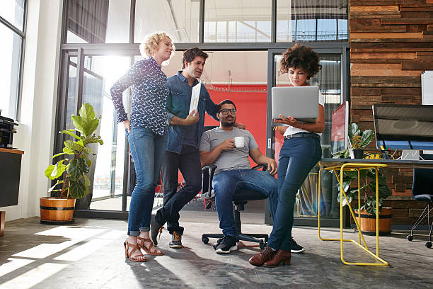 istock Multiracial group of designers meeting in modern office 510065212