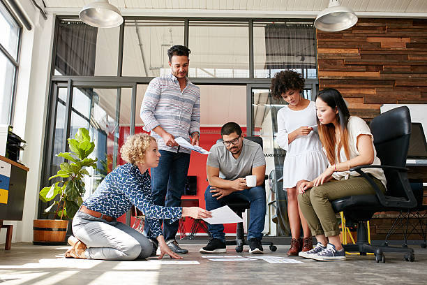 istock Designers planning layout on floor of office 510066010