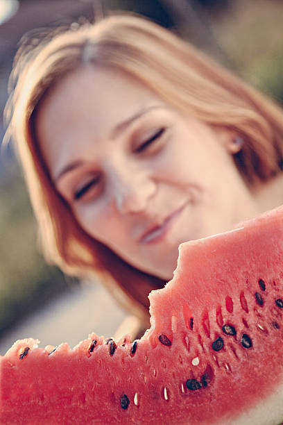 istock Woman Eating Watermelon 510066063