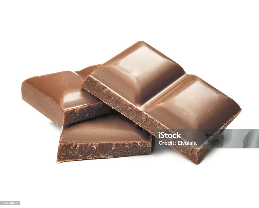 Chocolate pieces Stack milk chocolate pieces. Isolated on white. Block Shape Stock Photo