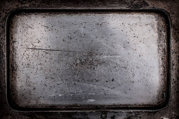 istock Scratched bottom of an old silver tray. 510066876
