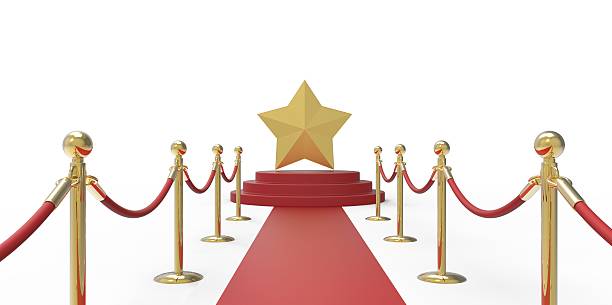 istock Gold star on red carpet VIP way gold fence 510068245