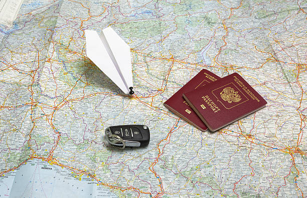istock Russian passports, keys and paper airplane on a map 510069638