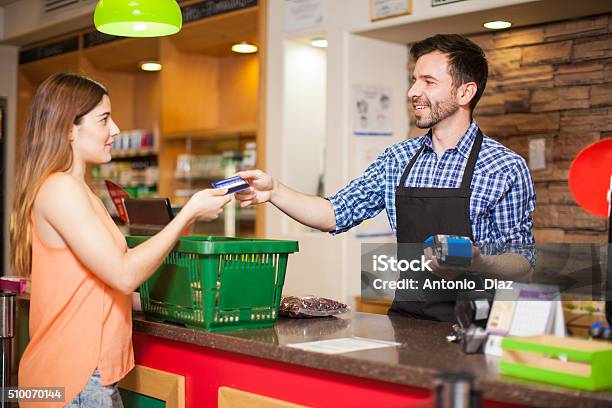 Paying With Credit Card At A Grocery Store Stock Photo - Download Image Now - Convenience Store, Checkout, Supermarket