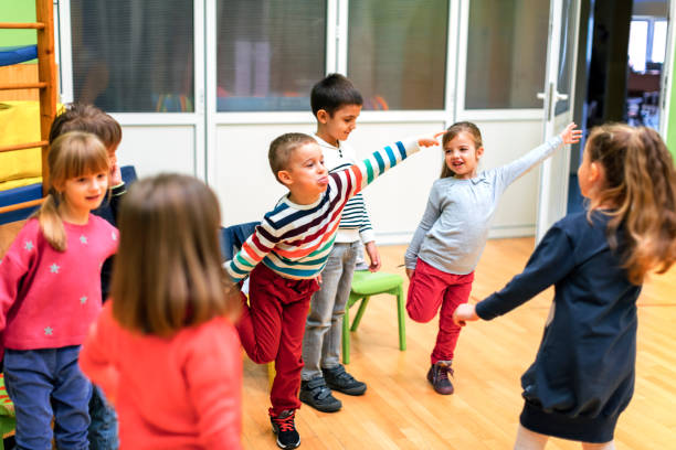 istock Group of children exercising in kindergarten. 510070468