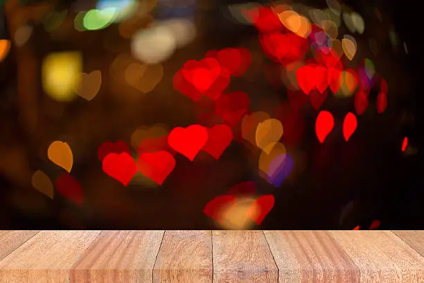 Photo of Empty perspective room with heart sparkling bokeh wall