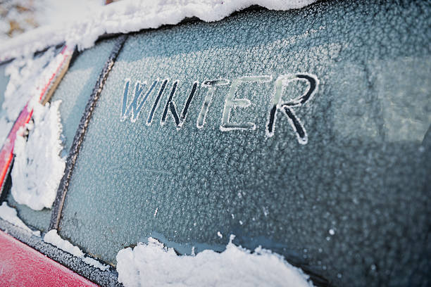 istock Frozen car window, car parked outside, winter transport issues 510071080