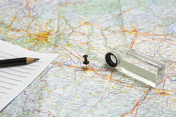 istock Thumbtack, list, pencil and magnifying glass on a map 510071140