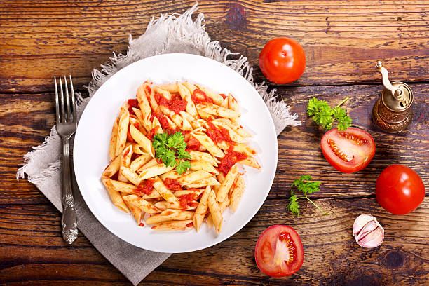 istock pan of pasta with tomato sauce 510071306