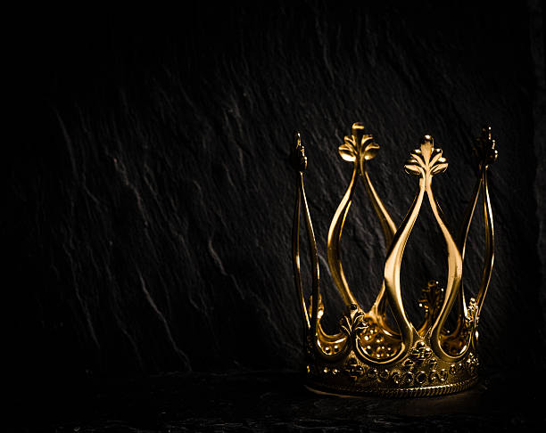 istock Golden crown with dark background 510072470
