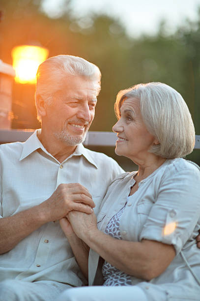 istock mature couple on  in summer park 510073420