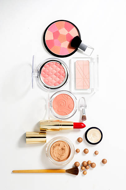 cosmetics on white background with light shadows stock photo