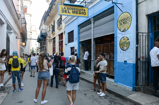 Havana, Cuba - 6 january 2016 - People walking and taking pictures in front of La Bodeguita del Medio restaurant in Old Havana, Cuba
