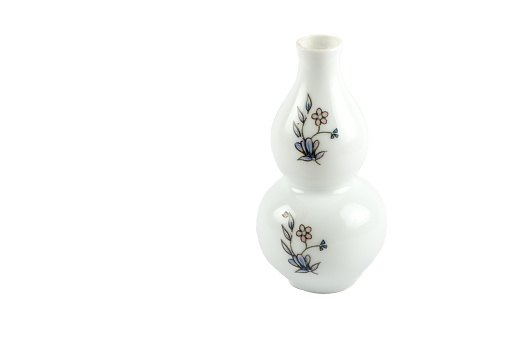 Isolated white japanese vase with pig over white