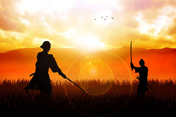 Ready For A Duel Two Samurai in duel stance facing each other on dramatic landscape knight person photos stock pictures, royalty-free photos & images