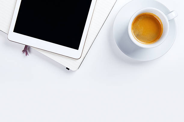 istock Top view of workplace with coffee and tablet 510079522