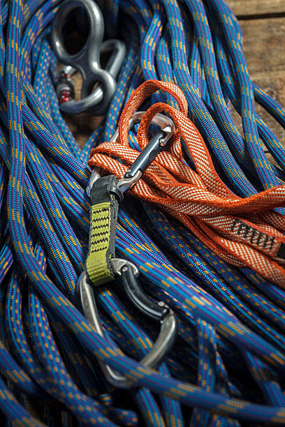 istock Climbing rope and equipment on wooden boards 510081534