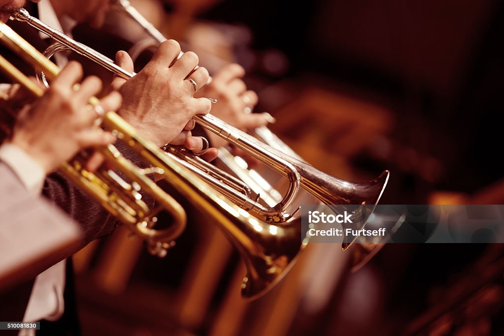 Hands trumpeters Hands trumpeters  in the orchestra closeup Jazz Music Stock Photo