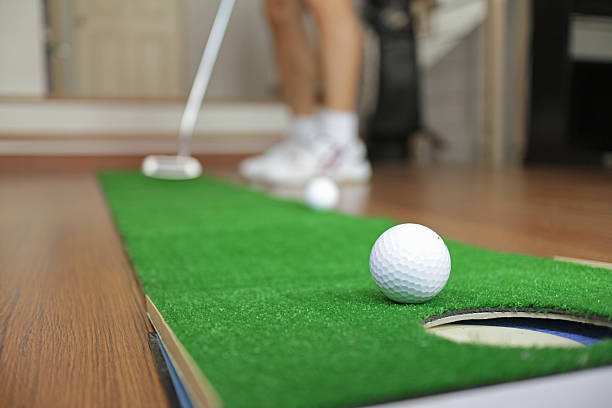 Home Golf Putt Practicing Home Golf Putt Practicing putting stock pictures, royalty-free photos & images