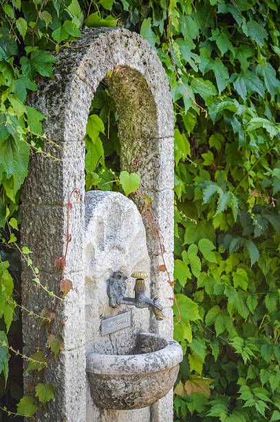 istock Ancient water fountain in Italy 510084110
