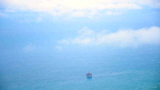 AERIAL  Oil platform in stormy sea